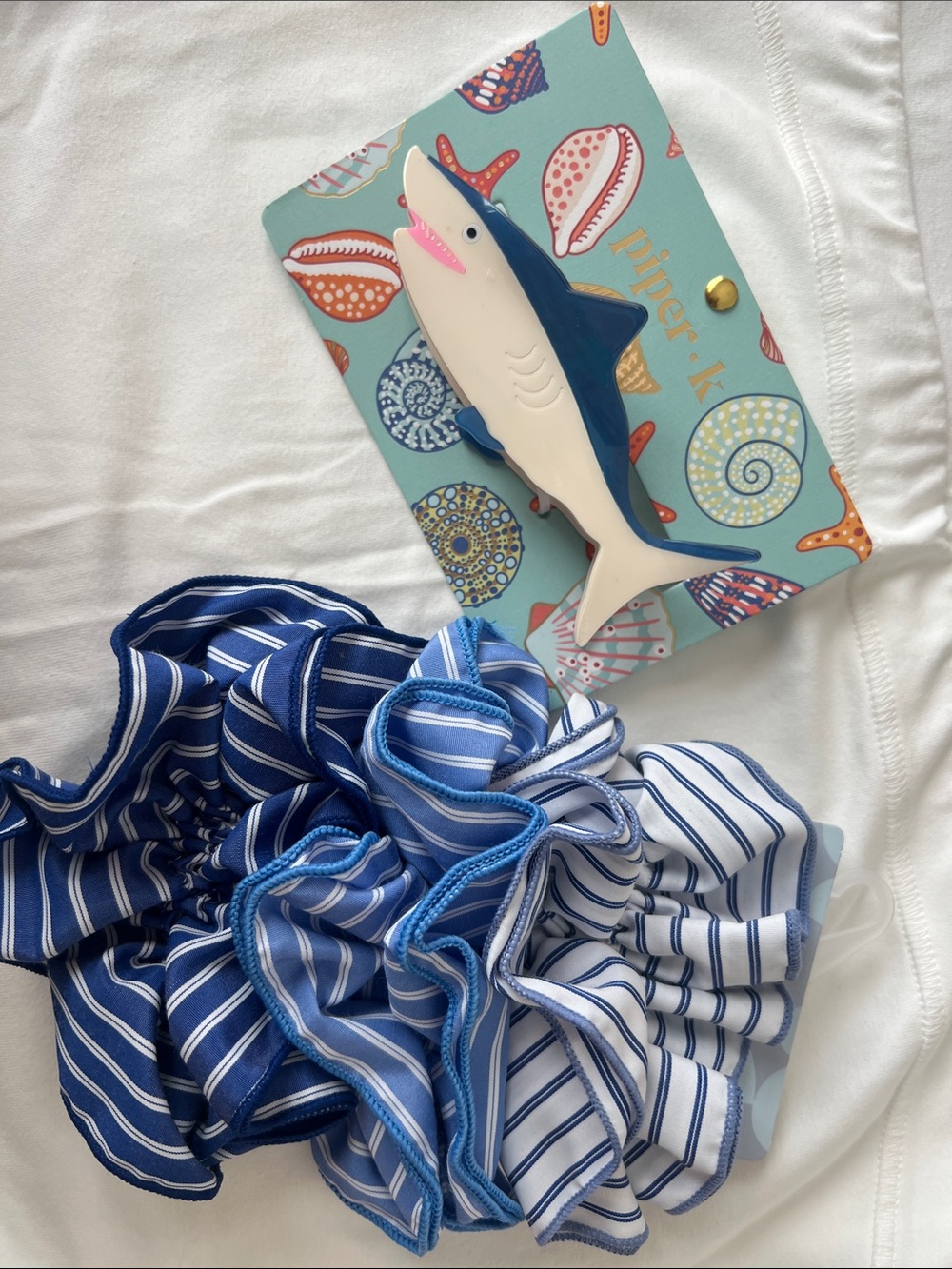 Piper • k shark hair claw and
Piper•k Striped Blue Ruffle Scrunchies - Set of 3